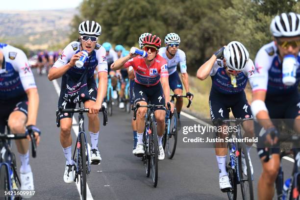 Remco Evenepoel of Belgium and Team Quick-Step - Alpha Vinyl - Red Leader Jersey with teammates compete during the 77th Tour of Spain 2022, Stage 17...