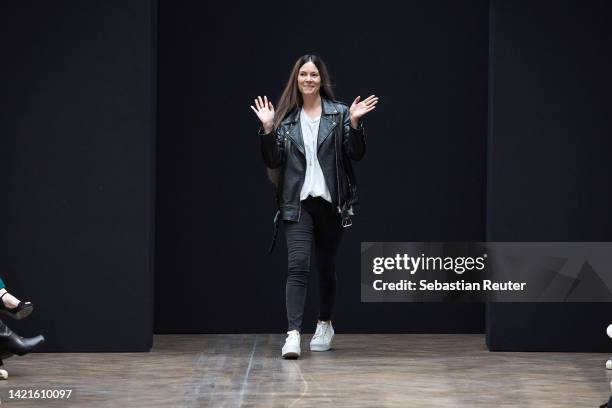Designer Rebekka Ruétz acknowledges the applaud of the audience after the Rebekka Ruétz show during the Mercedes-Benz Fashion Week Berlin Spring...