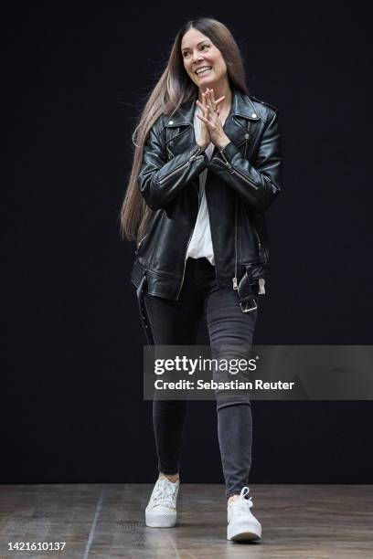 Designer Rebekka Ruétz acknowledges the applaud of the audience after the Rebekka Ruétz show during the Mercedes-Benz Fashion Week Berlin Spring...