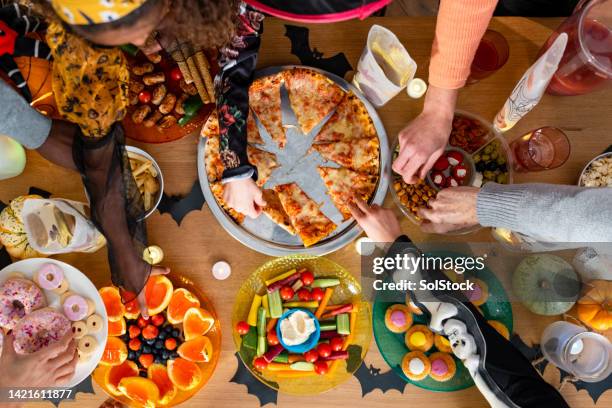 a tasty halloween buffet - halloween party stock pictures, royalty-free photos & images
