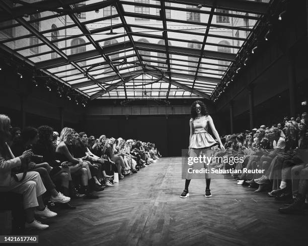 Model walks the runway at the Rebekka Ruétz show during the Mercedes-Benz Fashion Week Berlin Spring Summer 2023 at Telegraphenamt on September 07,...