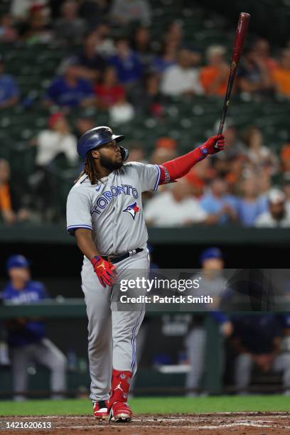 Vladimir Guerrero Jr. #27 of the Toronto Blue Jays celebrates as he bats against the Baltimore Orioles at Oriole Park at Camden Yards on September...