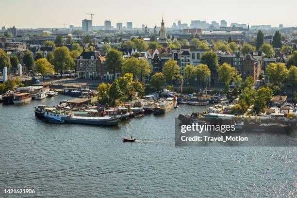 aerial view of boats at prins hendrikkade on a summer day, amsterdam - marina stock pictures, royalty-free photos & images