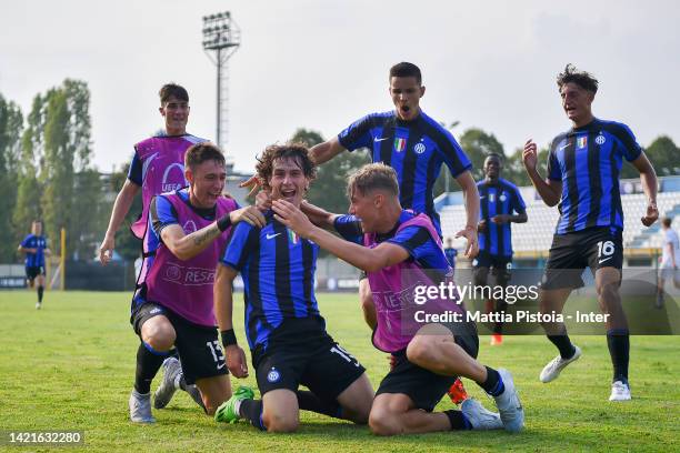 Dennis Curatolo of FC Internazionale celebrates after scoring the second goal woth his teammest during the UEFA Youth League match between FC...