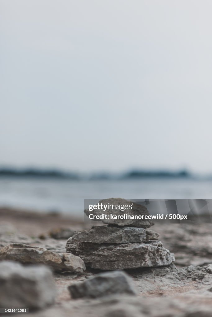 Close-up of rocks on beach against sky,Gotland,Sweden