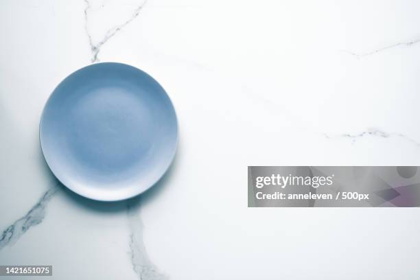 directly above shot of empty bowl on table - empty bowl stock pictures, royalty-free photos & images