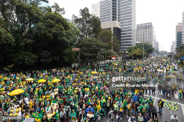 Supporters hold flags, banners and umbrellas during a demonstration in favor of President Jair Bolsonaro as Brazilians Celebrate 200th Anniversary of...