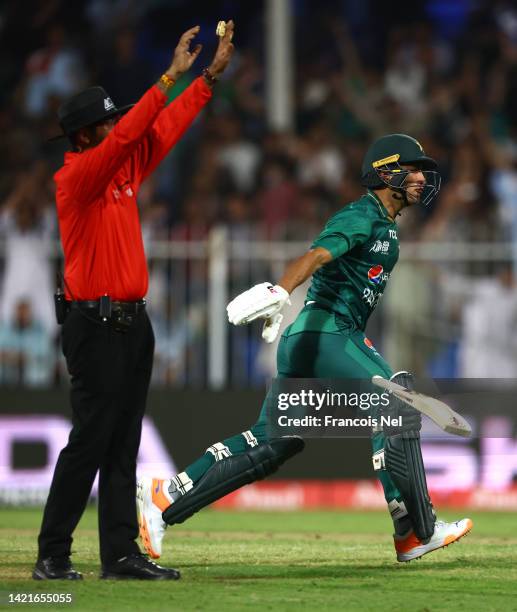 Naseem Shah of Pakistan celebrates after hitting the winning runs during the DP World Asia Cup match between Afghanistan and Pakistan at Sharjah...