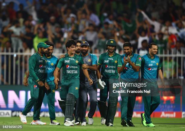 Naseem Shah of Pakistan celebrates with team mates after hitting the winning runs during the DP World Asia Cup match between Afghanistan and Pakistan...
