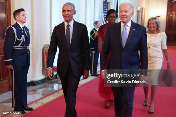 Former U.S. President Barack Obama, former First Lady Michelle Obama, U.S. President Joe Biden and First Lady Jill Biden arrive at a ceremony to...