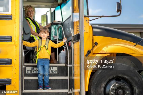 student getting of the school bus - kids sitting together in bus stock pictures, royalty-free photos & images