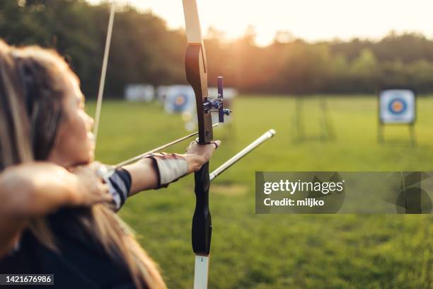 outdoors archery training - archery stock pictures, royalty-free photos & images