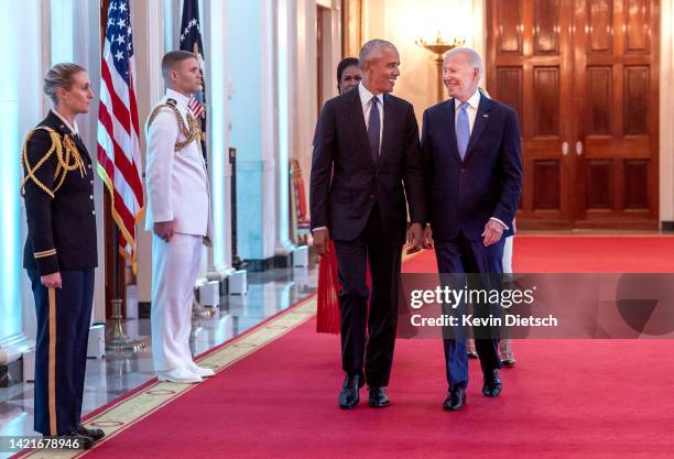 Former U.S. President Barack Obama and U.S. President Joe Biden arrive at a ceremony to unveil the official Obama White House portraits at the White...