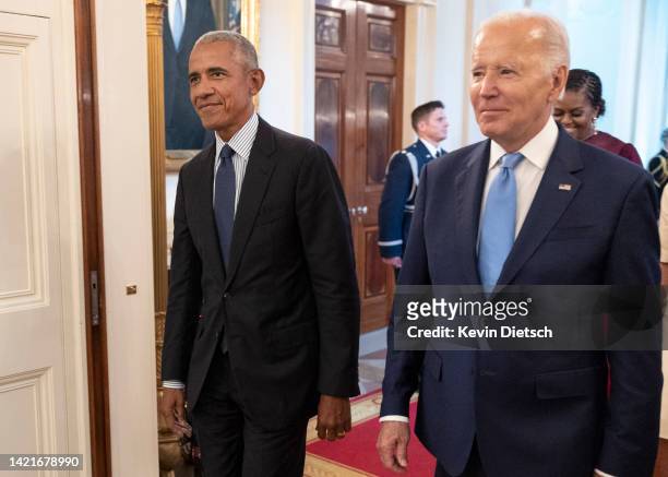 Former U.S. President Barack Obama and U.S. President Joe Biden arrive at a ceremony to unveil the official Obama White House portraits at the White...