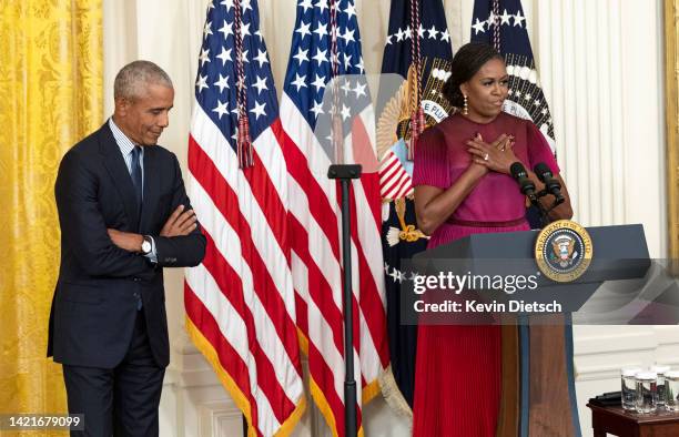 Former First Lady Michelle Obama delivers remarks alongside former U.S. President Barack Obama at a ceremony to unveil the official Obama White House...