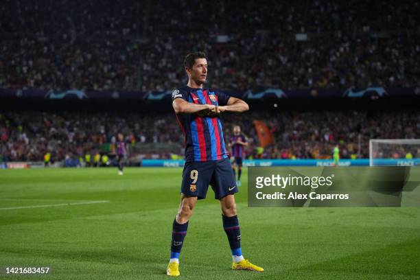 Robert Lewandowski of FC Barcelona celebrates after scoring their team's second goal during the UEFA Champions League group C match between FC...