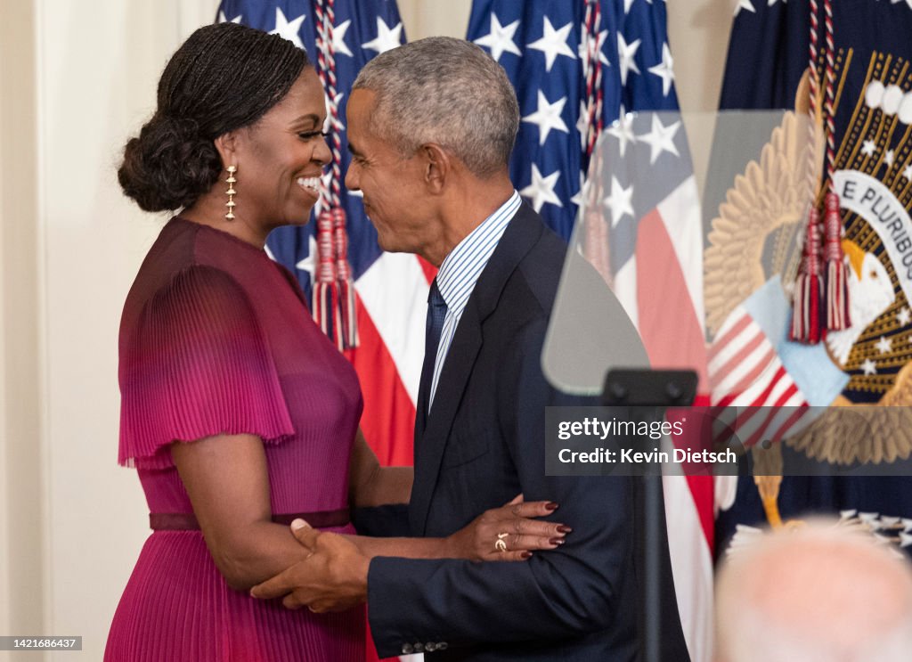 Barack And Michelle Obama Return To White House For Official Portrait Unveiling