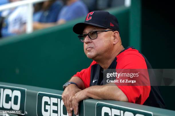 Manager Terry Francona of the Cleveland Guardians watches from the dugout during a game against the Kansas City Royals at Kauffman Stadium on...