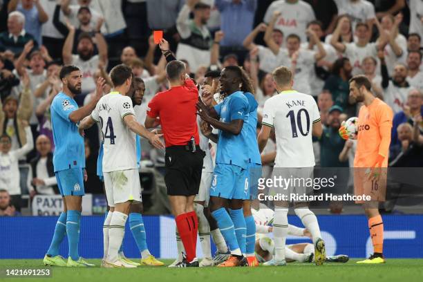 Eric Bailly of Marseille reacts to match referee Slavko Vincic who shows a red card to Chancel Mbemba of Marseille during the UEFA Champions League...