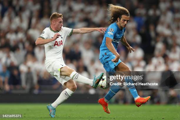 Matteo Guendouzi of Marseille is tackled by Dejan Kulusevski of Tottenham Hotspur during the UEFA Champions League group D match between Tottenham...