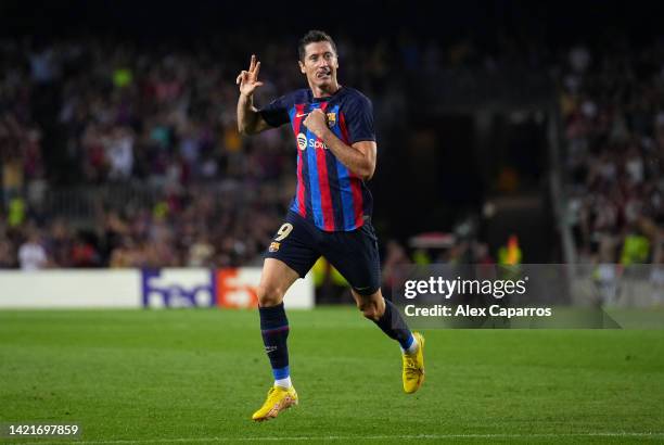 Robert Lewandowski of FC Barcelona celebrates after scoring their team's fourth goal and their hat-trick during the UEFA Champions League group C...