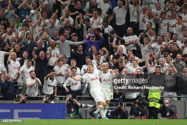 Richarlison of Tottenham Hotspur celebrates with teammate Dejan Kulusevski after scoring their team's second goal during the UEFA Champions League...