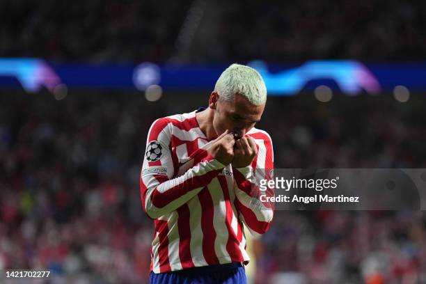 Antoine Griezmann of Atletico de Madrid celebrates after scoring their team's second goal during the UEFA Champions League group B match between...