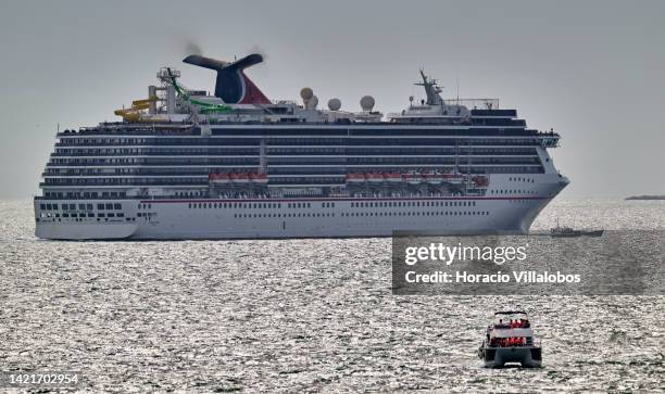 Carnival Pride, a Spirit-class cruise ship operated by Carnival Cruise Line, sails the Tagus River after leaving the Cruises Terminal on September...