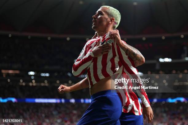 Antoine Griezmann of Atletico de Madrid celebrates after scoring their team's second goal during the UEFA Champions League group B match between...