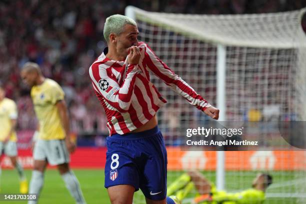 Antoine Griezmann of Atletico de Madrid celebrates after scoring their team's second goal during the UEFA Champions League group B match between...