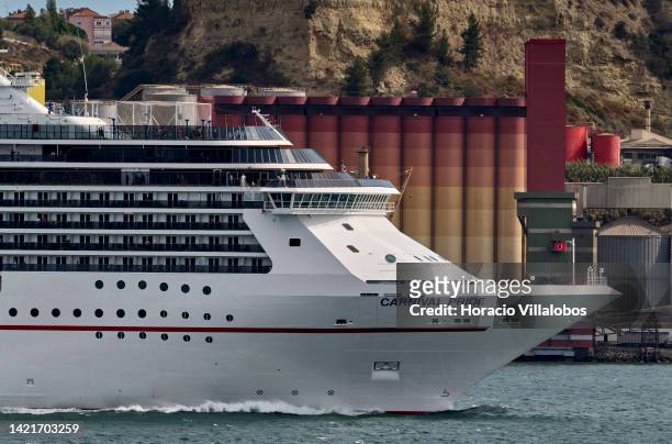Carnival Pride, a Spirit-class cruise ship operated by Carnival Cruise Line, sails the Tagus River after leaving the Cruise Terminal on September 07,...