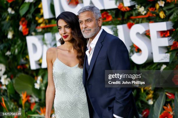 Amal Clooney and George Clooney attend the World Premiere of "Ticket to Paradise" at Odeon Luxe Leicester Square on September 07, 2022 in London,...