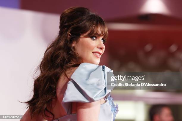 Zooey Deschanel attends the "Dreamin' Wild" red carpet at the 79th Venice International Film Festival on September 07, 2022 in Venice, Italy.