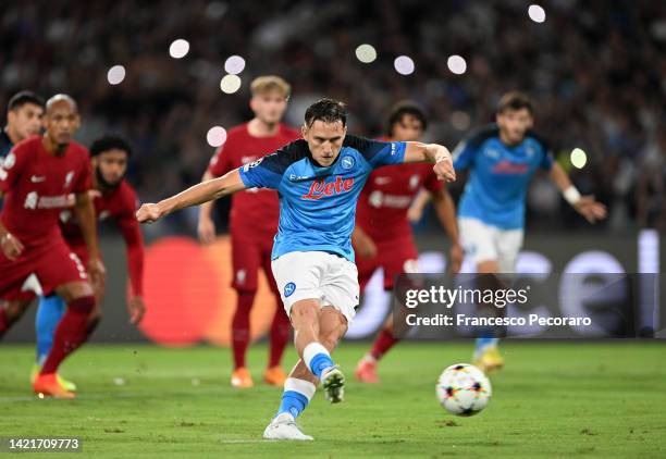 Piotr Zielinski of SSC Napoli scores their team's first goal from the penalty spot during the UEFA Champions League group A match between SSC Napoli...