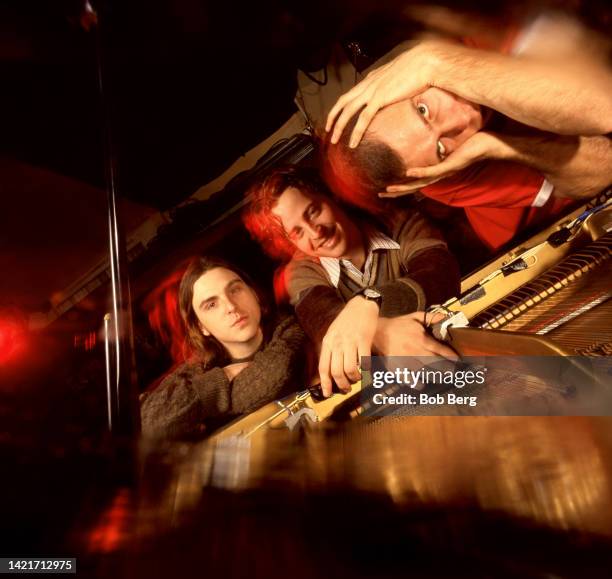 Bassist Robert Sledge, drummer Darren Jessee and pianist/lead vocalist Ben Folds, of the American alternative rock trio Ben Folds Five, pose for a...