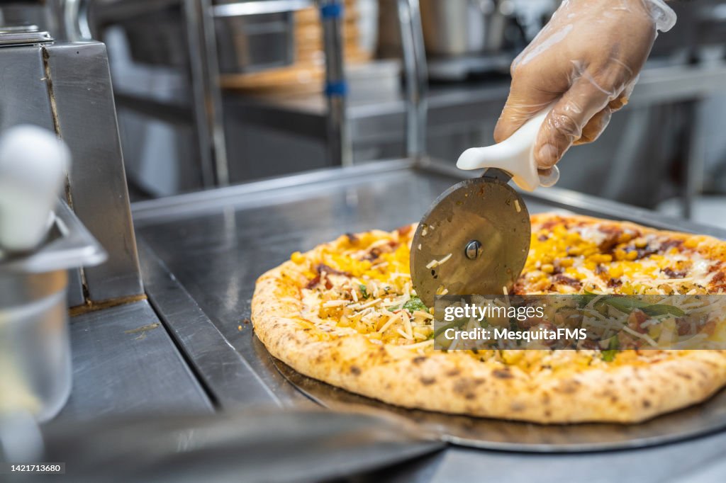 Chef preparing pizza