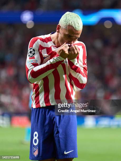 Antoine Griezmann of Atletico de Madrid celebrates after scoring their team's second goal during the UEFA Champions League group B match between...