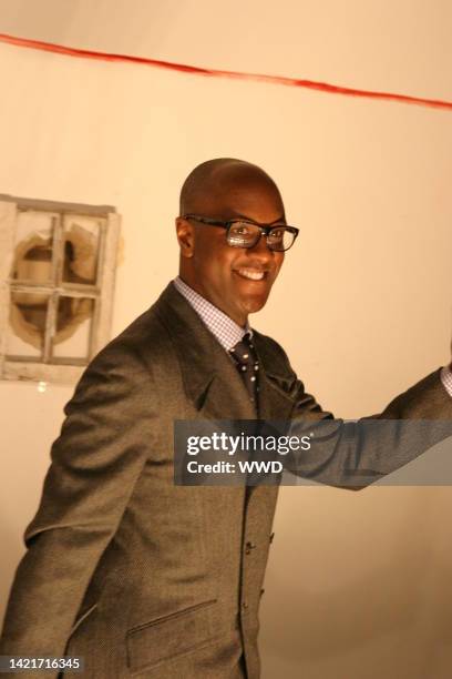 Designer Norman Norell walks down the runway at the Fall 2004 Norman Norell show in New York.