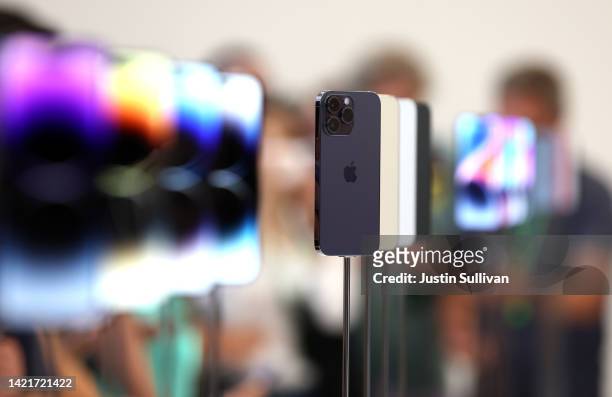 New iPhone 14 Pros are displayed during an Apple special event on September 07, 2022 in Cupertino, California. Apple CEO Tim Cook unveiled the new...