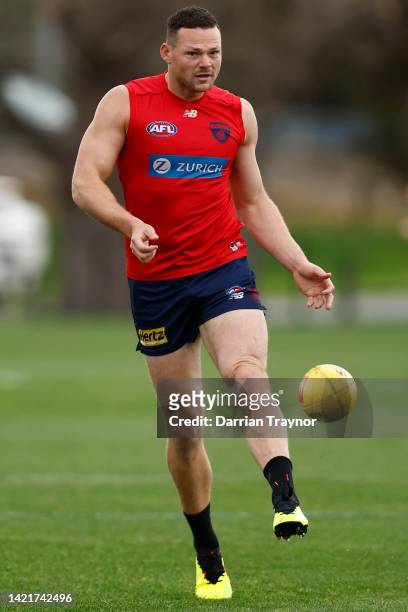 Steven May of the Demons kicks the ball during a Melbourne Demons AFL training session at Gosch's Paddock on September 08, 2022 in Melbourne,...