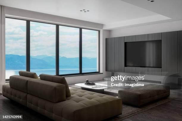 modern luxury living room with panoramic ocean view - home cinema system stock pictures, royalty-free photos & images