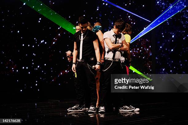 The candidates perform the opening song during the 'Deutschland Sucht Den Superstar' 5th Motto Show - Rehearsal at Coloneum on March 31, 2012 in...