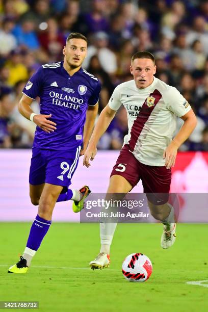 Dan Casey of Sacramento Republic FC and Ercan Kara of Orlando City battle for possession of the ball in the second half during the Lamar Hunt U.S....