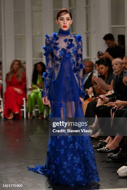 Teddy Quinlivan walks the runway during the Christian Siriano Spring/Summer 2023 NYFW Show at the Elizabeth Collective on September 07, 2022 in New...