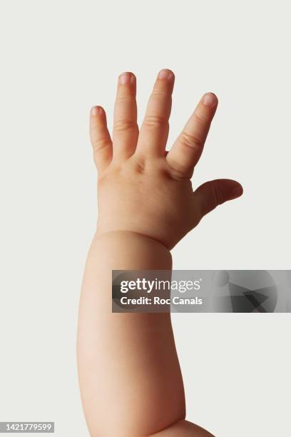 baby hand - baby reaching stock pictures, royalty-free photos & images