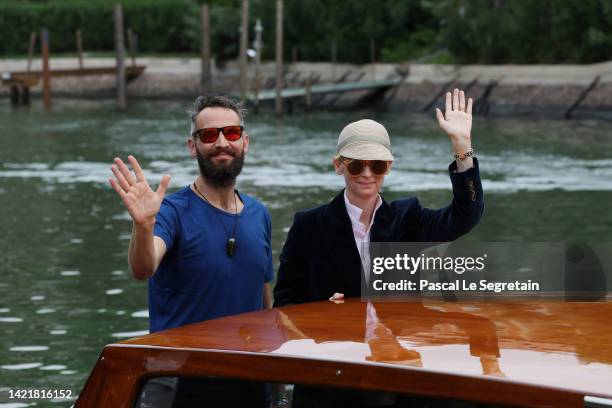Sandro Kopp and Tilda Swinton leave the Hotel Excelsior during the 79th Venice International Film Festival on September 08, 2022 in Venice, Italy.