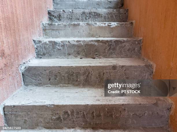 the stairs were chiseled out of concrete. - material stock illustrations ストックフォトと画像