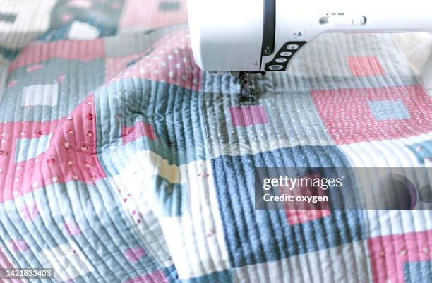 patchwork blanket witch square shape block. scandinavian hugge style. needlework and quilting. gray, pink and blue striped quilt blanket - patchwork quilt stock pictures, royalty-free photos & images