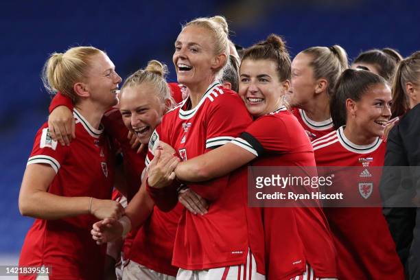 Ceri Holland celebrates with Elise Hughes, Sophie Ingle and Angharad James of Wales after the final whistle of the FIFA Women's World Cup 2023...