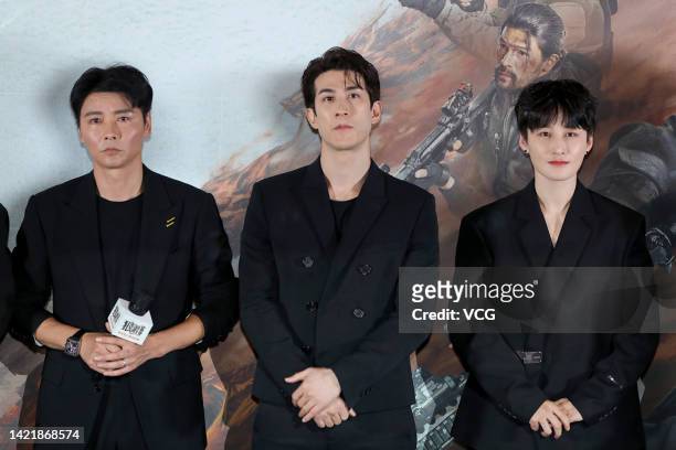 Actors Max Zhang, Aarif Lee Zhi-ting and Jiang Luxia attend "Wolfpack" premiere on September 7, 2022 in Beijing, China.